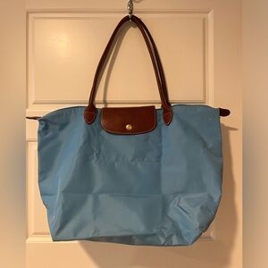 Baby blue Longchamp large Le Pluage tote.  Some dirt on bottom of bag